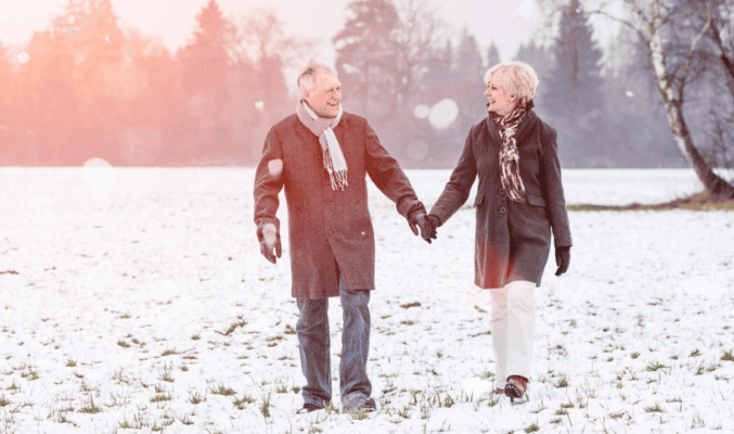 Senior couple walking in winter