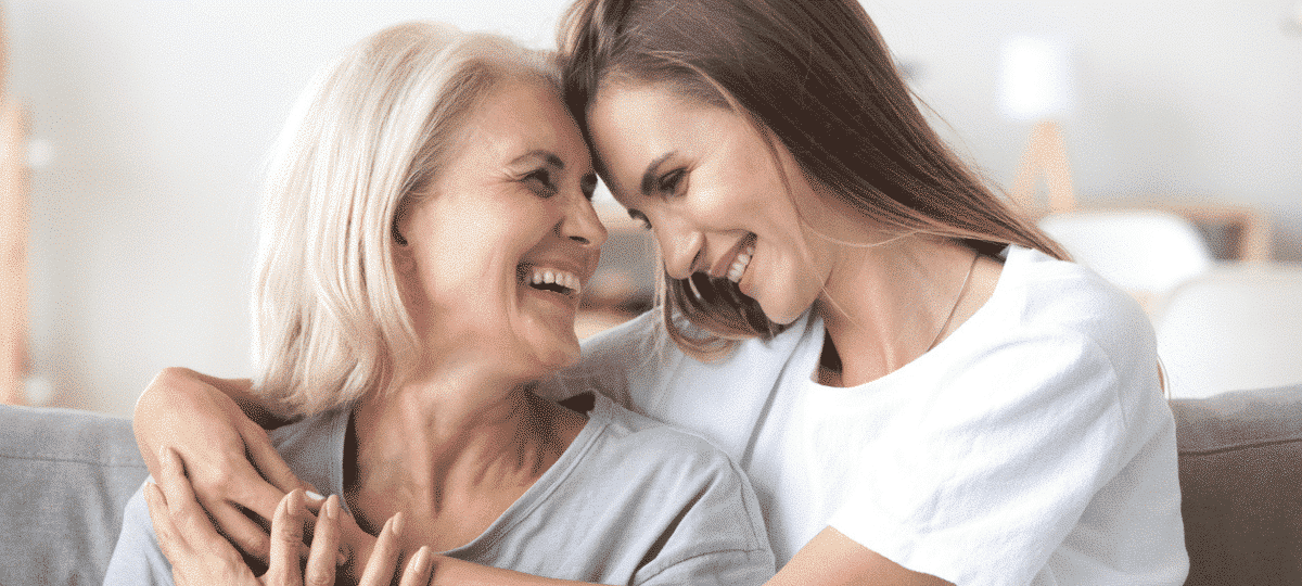 Women and daughter smiling