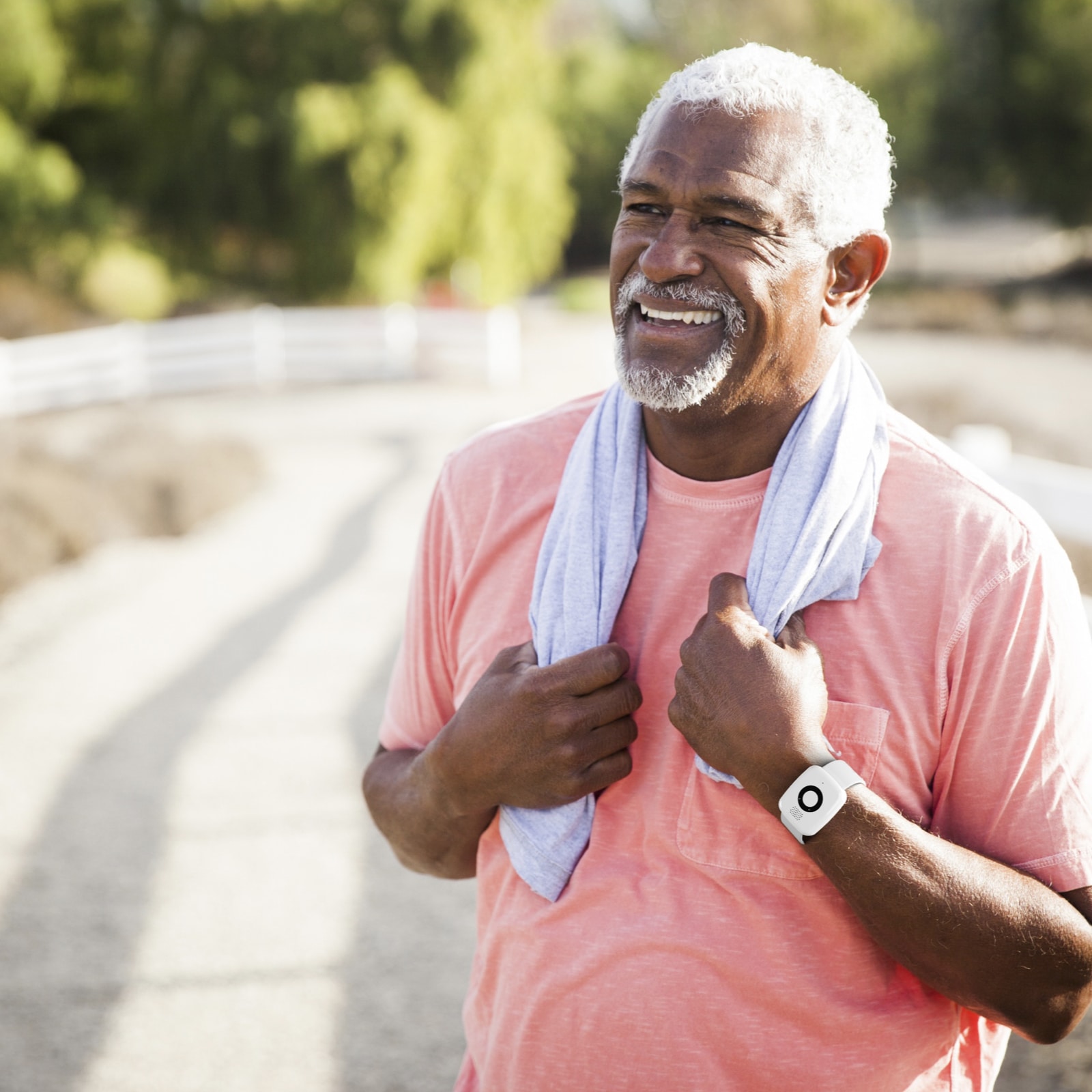 Man jogging while wearing Medical Alert Mini Mobile System