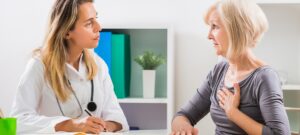Woman Talking to Doctor