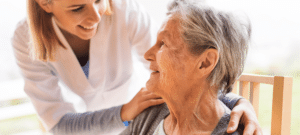 Nurse With Senior Woman