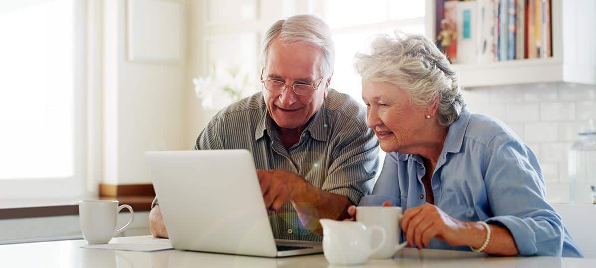 Seniors At Laptop