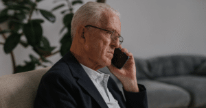 Senior man on the phone concerned about a free medical alert scam
