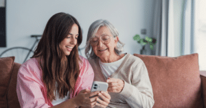 Smart home devices for seniors used with help from a family member at home